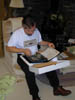 Pat viewing book